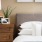 a bed with a lamp on it