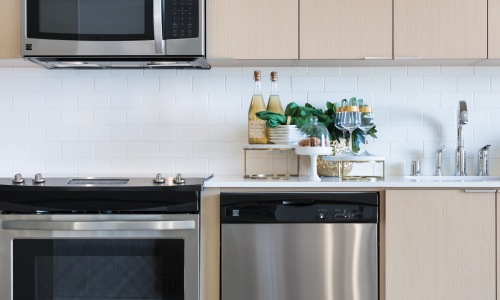 a kitchen with stainless steel appliances