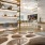 a room with a desk, tables, and chairs