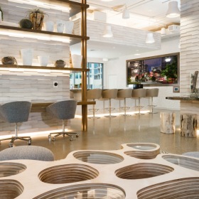 The essence of exceptional living a room with a desk, tables, and chairs