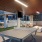 a ping pong table with a fire pit in the background