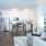 a living room with a large blue wall