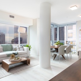 Beautiful living spaces with natural lighting a large living room with a large window