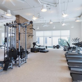 State-of-the-art amenities a gym with exercise equipment