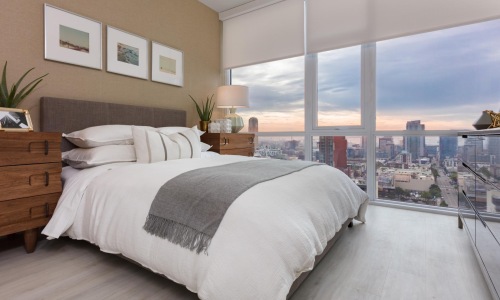 a bed with a large window