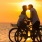 a man and woman on a bicycle