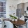 a kitchen with a table and chairs